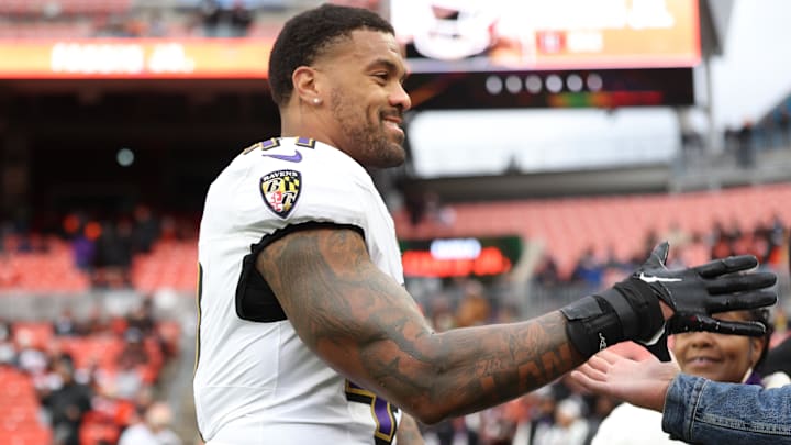 Nov 16, 2025; Cleveland, Ohio, USA; Baltimore Ravens linebacker Dre'Mont Jones (41) greets fans prior to a game against the Cleveland Browns at Huntington Bank Field. Mandatory Credit: Scott Galvin-Imagn Images