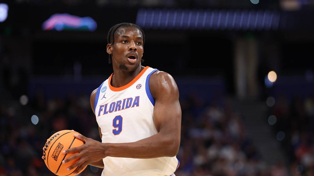 Mar 20, 2026; Tampa, FL, USA; Florida Gators center Rueben Chinyelu (9) looks to pass during the first half against the Prairie View A&M Panthers during a first round game of the men's 2026 NCAA Tournament at Benchmark International Arena. Mandatory Credit: Nathan Ray Seebeck-Imagn Images