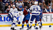 Oct 30, 2024; Denver, Colorado, USA; Tampa Bay Lightning defenseman Emil Lilleberg (78) and Colorado Avalanche center Matt Stienburg (36) scuffle ahead of defenseman Darren Raddysh (43) and defenseman Oliver Kylington (58) in the second period at Ball Arena. Mandatory Credit: Isaiah J. Downing-Imagn Images