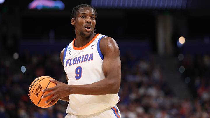 Mar 20, 2026; Tampa, FL, USA; Florida Gators center Rueben Chinyelu (9) looks to pass during the first half against the Prairie View A&M Panthers during a first round game of the men's 2026 NCAA Tournament at Benchmark International Arena. Mandatory Credit: Nathan Ray Seebeck-Imagn Images