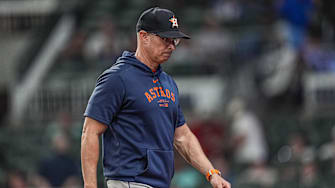 Sep 13, 2025; Cumberland, Georgia, USA; Houston Astros manager Joe Espada (19) on the field during the game against the Atlanta Braves during the eighth inning at Truist Park. 