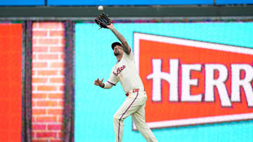 Jun 14, 2025; Philadelphia, Pennsylvania, USA; Philadelphia Phillies outfielder Nick Castellanos (8) fields a fly ball against the Toronto Blue Jays in the sixth inning at Citizens Bank Park. Mandatory Credit: Kyle Ross-Imagn Images