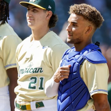 American League Futures catcher Harry Ford of the Seattle Mariners (center) stands before the All-Star Futures Game on July 8, 2023, at T-Mobile Park.