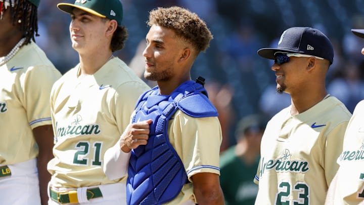 American League Futures catcher Harry Ford of the Seattle Mariners (center) stands before the All-Star Futures Game on July 8, 2023, at T-Mobile Park.