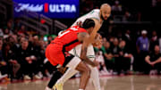 Jan 3, 2025; Houston, Texas, USA; Boston Celtics guard Derrick White (9) handles the ball against Houston Rockets guard Jalen Green (4) during the game at Toyota Center. Mandatory Credit: Erik Williams-Imagn Images