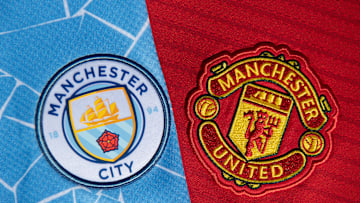 The Manchester City and Manchester United Badges