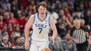 Mar 15, 2025; Charlotte, NC, USA; Duke Blue Devils guard Kon Knueppel (7) brings the ball up court against the Louisville Cardinals during the 2025 ACC Conference Championship game at Spectrum Center. Mandatory Credit: Jim Dedmon-Imagn Images