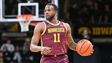 Jan 21, 2025; Iowa City, Iowa, USA; Minnesota Golden Gophers guard Femi Odukale (11) controls the ball against the Iowa Hawkeyes during the first half at Carver-Hawkeye Arena. Mandatory Credit: Jeffrey Becker-Imagn Images