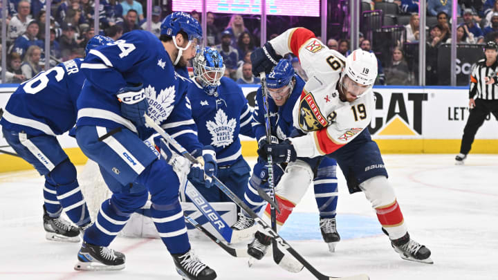 May 12, 2023; Toronto, Ontario, CAN;  Florida Panthers forward Matthew Tkachuk (19) battles for a loose puck with Toronto Maple Leafs forward Auston Matthews (34) and defenseman Jake McCabe (22) in front of goalie Joseph Woll (60) in the second period in game five of the second round of the 2023 Stanley Cup Playoffs at Scotiabank Arena. Mandatory Credit: Dan Hamilton-USA TODAY Sports