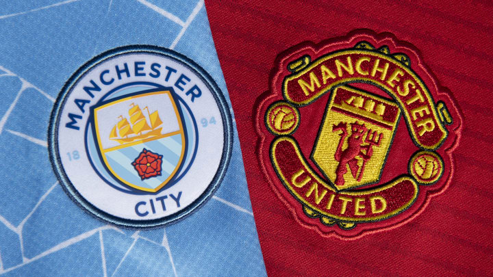 The Manchester City and Manchester United Badges