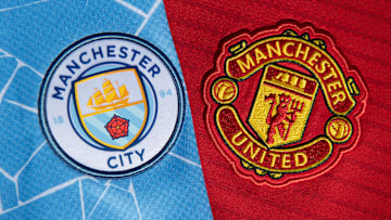 The Manchester City and Manchester United Badges