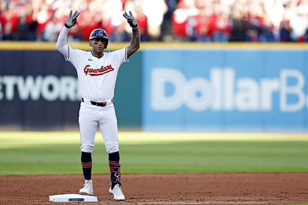 Brayan Rocchio (4) celebrates after hitting a double