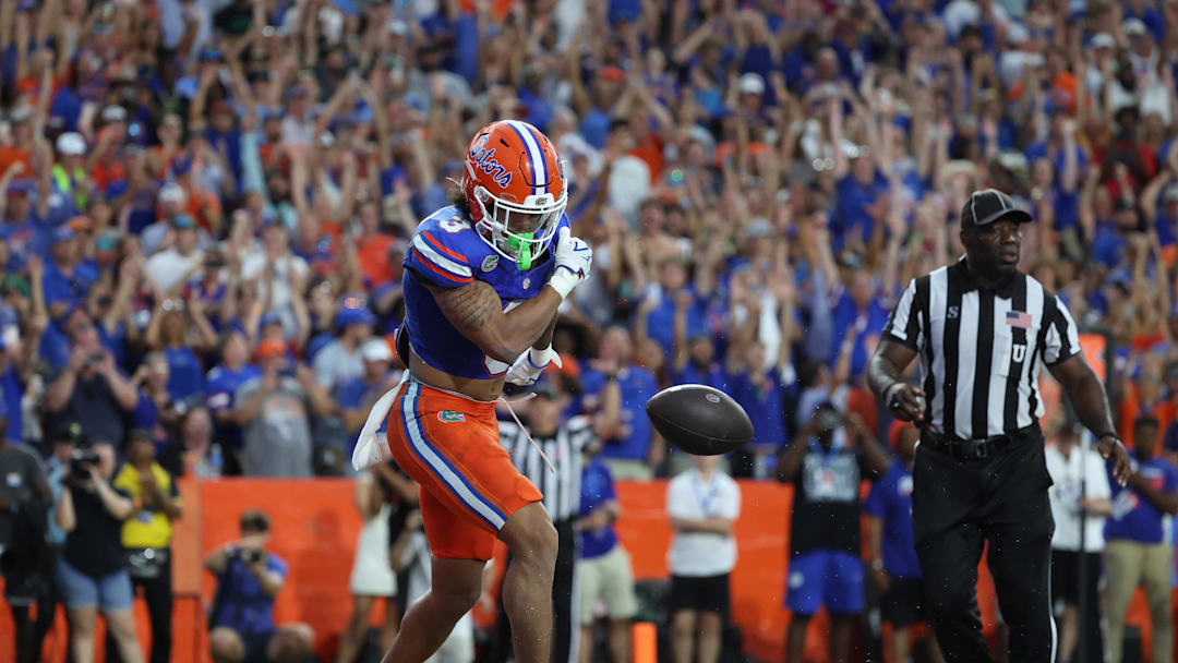 Sep 6, 2025; Gainesville, Florida, USA; Florida Gators wide receiver Eugene Wilson III (3) scores a touchdown against the South Florida Bulls during the second half at Ben Hill Griffin Stadium. Mandatory Credit: Kim Klement Neitzel-Imagn Images