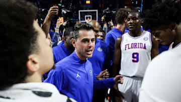 Florida Head Coach Todd Golden talks to players during Florida's clash against Tennessee