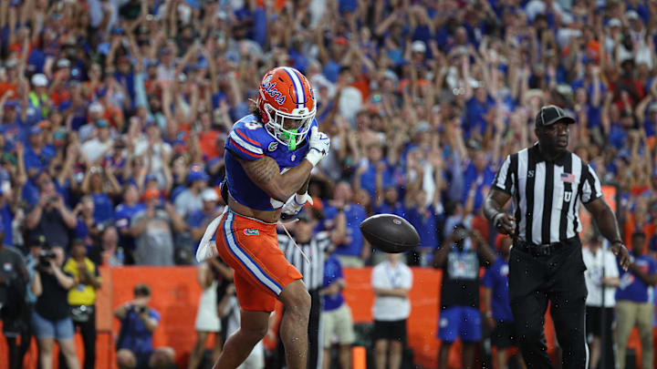 Sep 6, 2025; Gainesville, Florida, USA; Florida Gators wide receiver Eugene Wilson III (3) scores a touchdown against the South Florida Bulls during the second half at Ben Hill Griffin Stadium. Mandatory Credit: Kim Klement Neitzel-Imagn Images