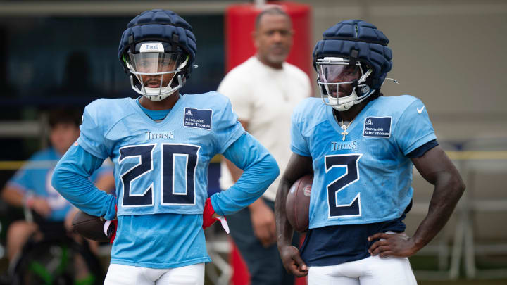 Tennessee Titans running backs Tony Pollard (20) and Tyjae Spears (2) run through drills during training camp at Ascension Saint Thomas Sports Park Wednesday, Aug. 7, 2024.