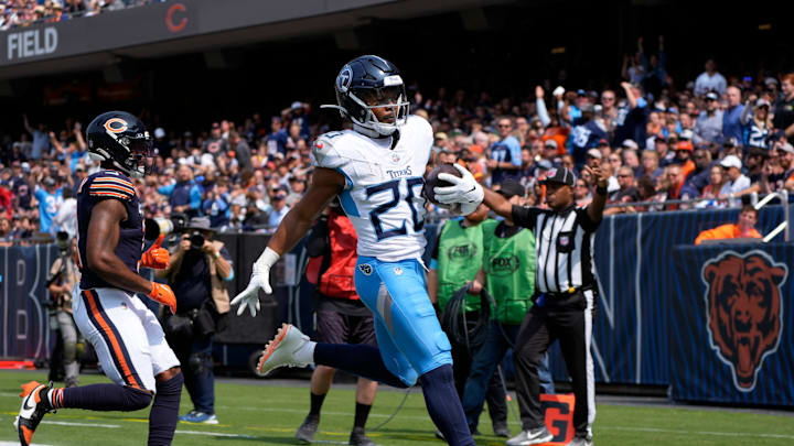 Tennessee Titans running back Tony Pollard (20) runs for a touchdown against he Chicago Bears at Soldier Field in Chicago, Ill., Sunday, Sept. 8, 2024.