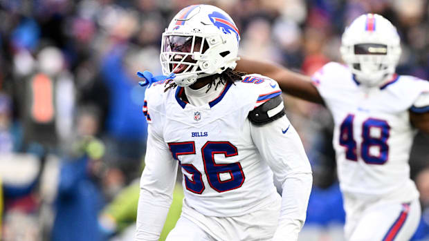 Buffalo Bills defensive end Javon Solomon reacts after recovering a fumble against the New England Patriots 