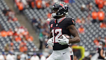 Nov 2, 2025; Houston, Texas, USA; Houston Texans wide receiver Nico Collins (12) warms up before a game against the Denver Broncos at NRG Stadium. 