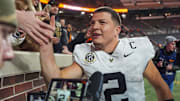 Vanderbilt quarterback Diego Pavia (2) celebrates with fans after winning a NCAA football game between Tennessee and Vanderbilt at Neyland Stadium in Knoxville, Tenn., on Nov. 29, 2025.
