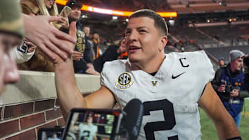 Vanderbilt quarterback Diego Pavia (2) celebrates with fans after winning a NCAA football game between Tennessee and Vanderbilt at Neyland Stadium in Knoxville, Tenn., on Nov. 29, 2025.