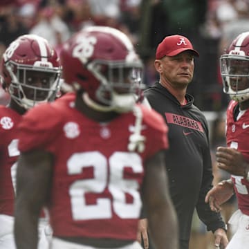 Aug 31, 2024; Tuscaloosa, Alabama, USA;  Alabama Crimson Tide head coach Kalen DeBoer watches his team warm up before a game against the Western Kentucky Hilltoppers at Bryant-Denny Stadium. The game will be the first with DeBoer as head coach of the Crimson Tide.