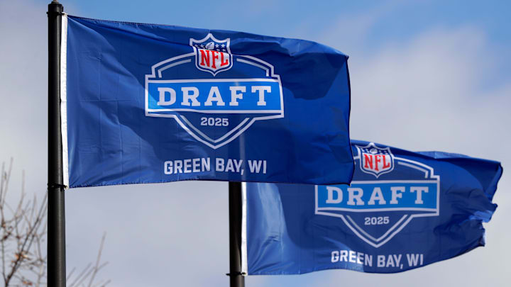 Flags promoting the 2025 NFL Draft are pictured in Green Bay, Wisconsin. 