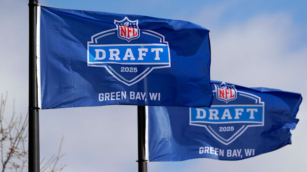 Flags promoting the 2025 NFL Draft at Leicht Memorial Park in Green Bay, Wisconsin. 