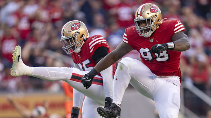 San Francisco 49ers defensive tackle Javon Hargrave (98, right) and defensive end Drake Jackson (95, left)