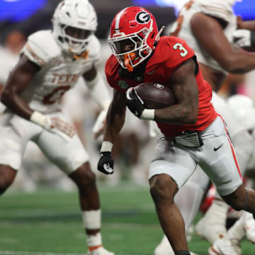 Dec 7, 2024; Atlanta, GA, USA; Georgia Bulldogs running back Nate Frazier (3) rushes the ball against the Texas Longhorns during the second half in the 2024 SEC Championship game at Mercedes-Benz Stadium. Mandatory Credit: Brett Davis-Imagn Images