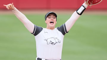 May 25, 2025; Fayetteville, AR, USA; Arkansas Razorbacks first baseman Bri Ellis (77) prior to facing the Ole Miss Rebels in game three of the Fayetteville Super Regional at Bogle Park. Mandatory Credit: Nelson Chenault-Imagn Images
