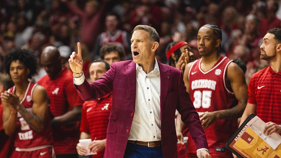 Feb 15, 2025; Tuscaloosa, Alabama, USA; Alabama Crimson Tide head coach Nate Oats directs his team against the Auburn Tigers during the first half at Coleman Coliseum. Mandatory Credit: Will McLelland-Imagn Images