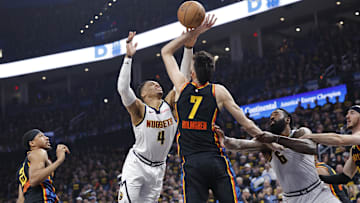 May 7, 2025; Oklahoma City, Oklahoma, USA; Oklahoma City Thunder forward Chet Holmgren (7) defends a shot by Denver Nuggets guard Russell Westbrook (4) in the second quarter during game two of the second round for the 2025 NBA Playoffs at Paycom Center. Mandatory Credit: Alonzo Adams-Imagn Images