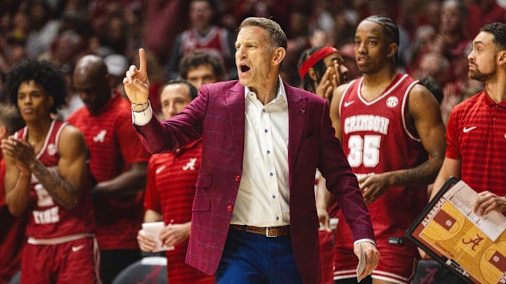 Feb 15, 2025; Tuscaloosa, Alabama, USA; Alabama Crimson Tide head coach Nate Oats directs his team against the Auburn Tigers during the first half at Coleman Coliseum. Mandatory Credit: Will McLelland-Imagn Images
