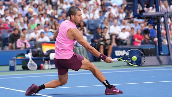 Carlos Alcaraz hits to Arthur Rinderknech at the 2025 U.S. Open tennis tournament during an incredible match Carlos Alcaraz hits to Arthur Rinderknech at the 2025 U.S. Open tennis tournament during an incredible match