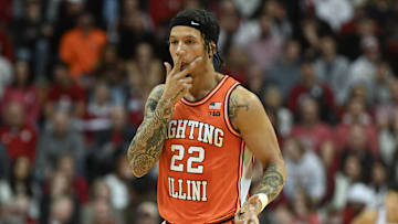 Jan 14, 2025; Bloomington, Indiana, USA; Illinois Fighting Illini guard Tre White (22) celebrates after a play during the first half against the Indiana Hoosiers at Simon Skjodt Assembly Hall. Mandatory Credit: Robert Goddin-Imagn Images