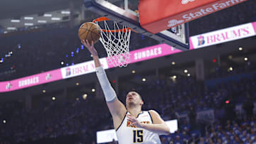 May 18, 2025; Oklahoma City, Oklahoma, USA; Denver Nuggets center Nikola Jokic (15) goes to the basket against the Oklahoma City Thunder in the first quarter during game seven of the second round for the 2025 NBA Playoffs at Paycom Center. Mandatory Credit: Alonzo Adams-Imagn Images