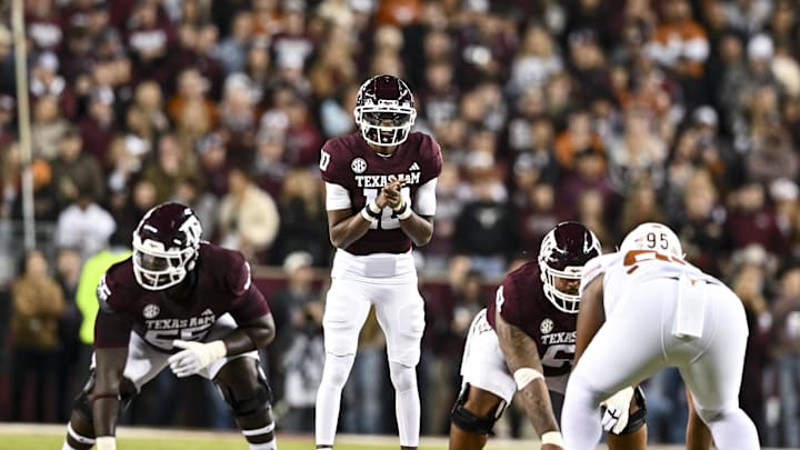 Nov 30, 2024; College Station, Texas, USA; Texas A&M Aggies quarterback Marcel Reed (10) calls the play during the first half against the Texas Longhorns at Kyle Field. Mandatory Credit: Maria Lysaker-Imagn Images 