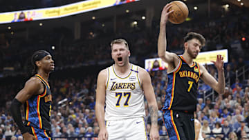 Apr 6, 2025; Oklahoma City, Oklahoma, USA; Los Angeles Lakers guard Luka Doncic (77) yells after scoring against the Oklahoma City Thunder during the second quarter at Paycom Center. Mandatory Credit: Alonzo Adams-Imagn Images