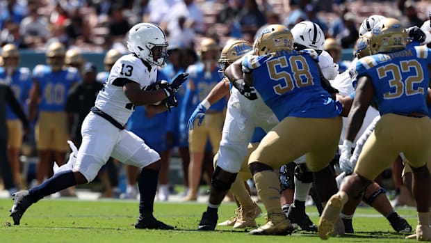 Penn State Nittany Lions running back Kaytron Allen runs for a touchdown during the first quarter against the UCLA Bruins.