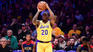 Mar 4, 2025; Los Angeles, California, USA; Los Angeles Lakers guard Shake Milton (20) shoots against the New Orleans Pelicans during the first half at Crypto.com Arena. Mandatory Credit: Gary A. Vasquez-Imagn Images