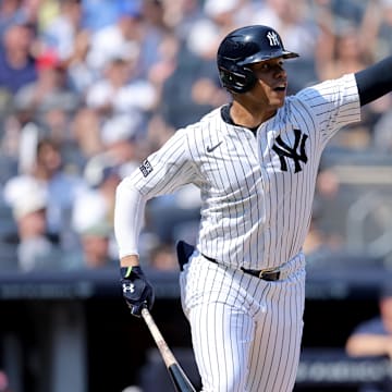 Sep 14, 2024; Bronx, New York, USA; New York Yankees right fielder Juan Soto (22) reacts after hitting a single against the Boston Red Sox during the third inning at Yankee Stadium.