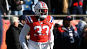 Dec 1, 2024; Foxborough, Massachusetts, USA; New England Patriots linebacker Anfernee Jennings (33) warms up before a game against the Indianapolis Colts at Gillette Stadium. Mandatory Credit: Eric Canha-Imagn Images