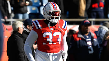 Dec 1, 2024; Foxborough, Massachusetts, USA; New England Patriots linebacker Anfernee Jennings (33) warms up before a game against the Indianapolis Colts at Gillette Stadium.