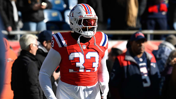 Dec 1, 2024; Foxborough, Massachusetts, USA; New England Patriots linebacker Anfernee Jennings (33) warms up before a game against the Indianapolis Colts at Gillette Stadium.