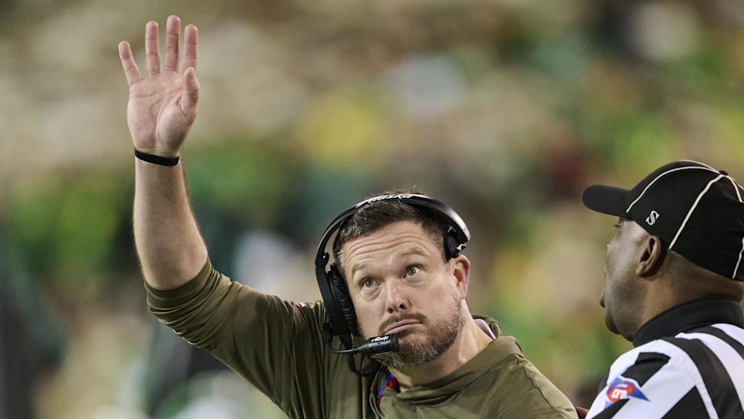 Nov 14, 2025; Eugene, Oregon, USA; Oregon Ducks head coach Dan Lanning calls for a timeout during the first half against the Minnesota Golden Gophers at Autzen Stadium. Mandatory Credit: Troy Wayrynen-Imagn Images