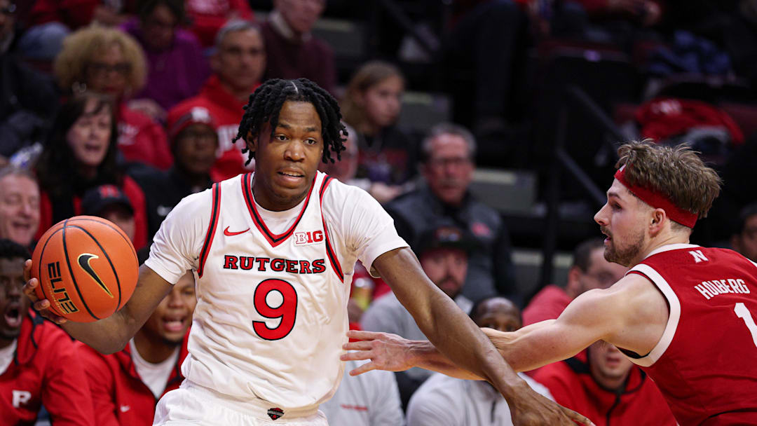 Feb 7, 2026; Piscataway, New Jersey, USA; Rutgers Scarlet Knights forward Dylan Grant (9) is guarded by Nebraska Cornhuskers guard Sam Hoiberg (1) during the second half at Jersey Mike's Arena. Mandatory Credit: Vincent Carchietta-Imagn Images Feb 7, 2026; Piscataway, New Jersey, USA; Rutgers Scarlet Knights forward Dylan Grant (9) is guarded by Nebraska Cornhuskers guard Sam Hoiberg (1) during the second half at Jersey Mike's Arena. Mandatory Credit: Vincent Carchietta-Imagn Images