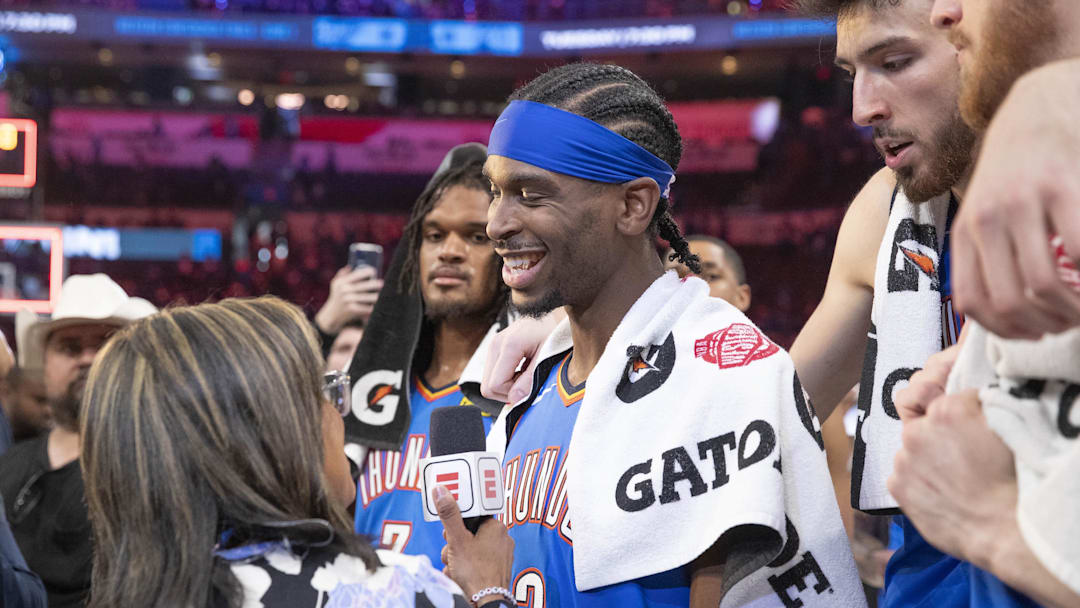 Oklahoma City Thunder guard Shai Gilgeous-Alexander talks to a tv reporter following his teams win against the Denver Nuggets. Oklahoma City Thunder guard Shai Gilgeous-Alexander talks to a tv reporter following his teams win against the Denver Nuggets.