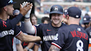 Aug 6, 2025; Detroit, Michigan, USA;  Minnesota Twins outfielder Alan Roden (19) receives congratulations from teammates after he hits a home run in the sixth inning against the Detroit Tigers at Comerica Park.