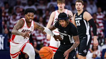 Jan 27, 2025; Tucson, Arizona, USA; Arizona Wildcats guard Caleb Love (1) and Iowa State Cyclones guard Keshon Gilbert (10) run toward the ball during the second half at McKale Center. Mandatory Credit: Aryanna Frank-Imagn Images
